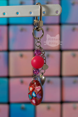 Faceted Cabochon With Hearts Handbag Charm